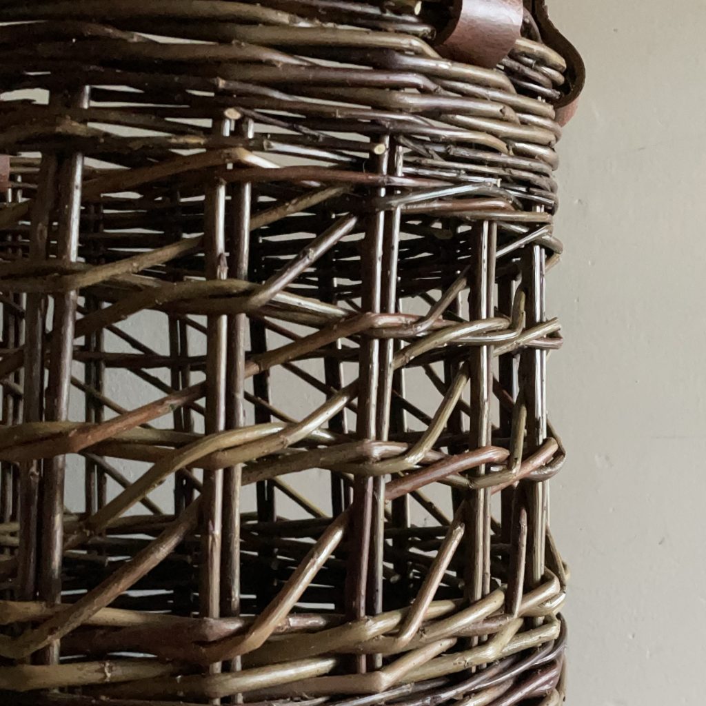 Substantial Large brown willow storage basket Irish diagonal weave detail